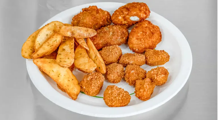 Meat Lovers Pizza with generous portions at V Trail Pizza Edmonton